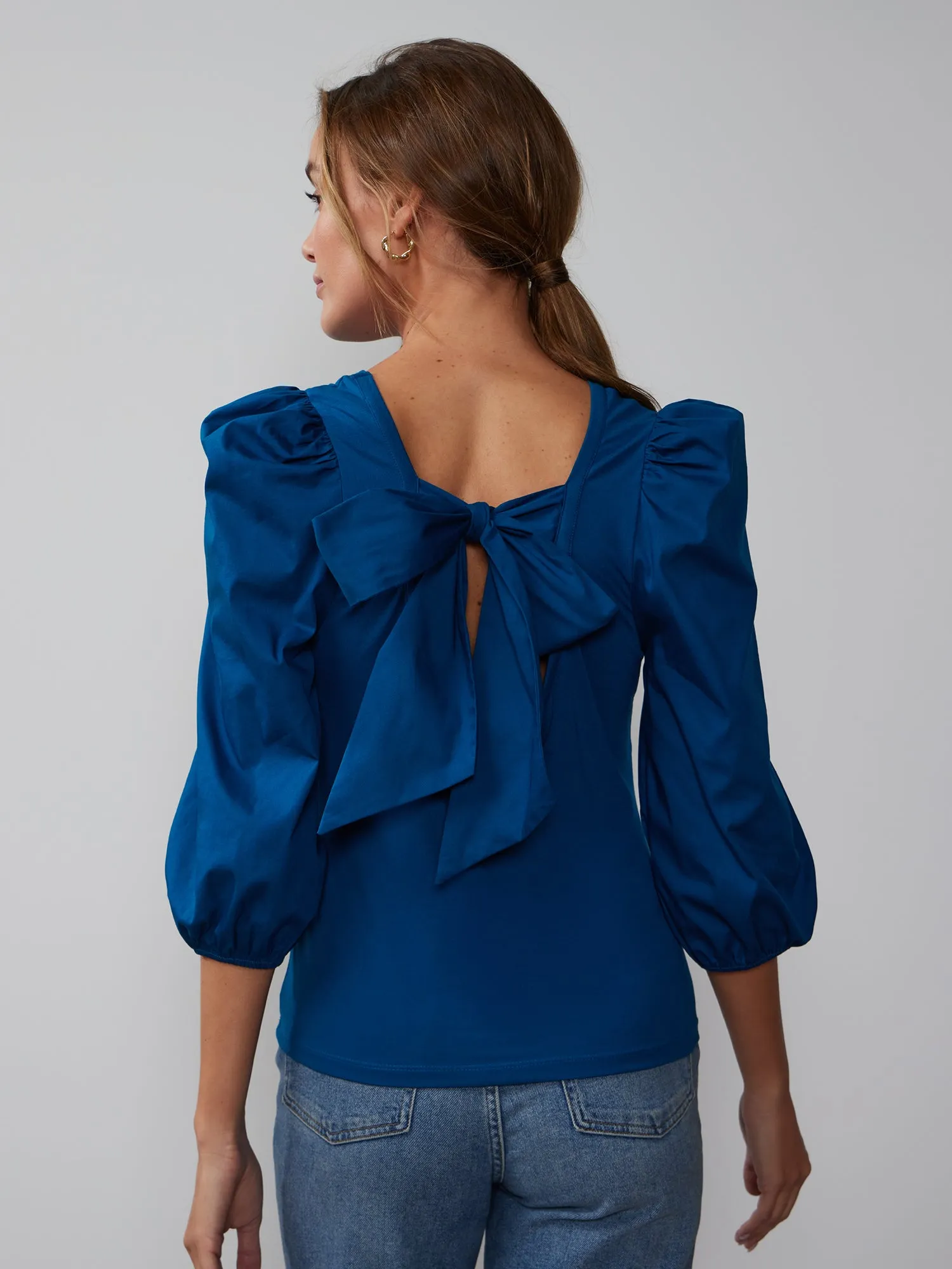 Quarter Sleeve Back Bow Top